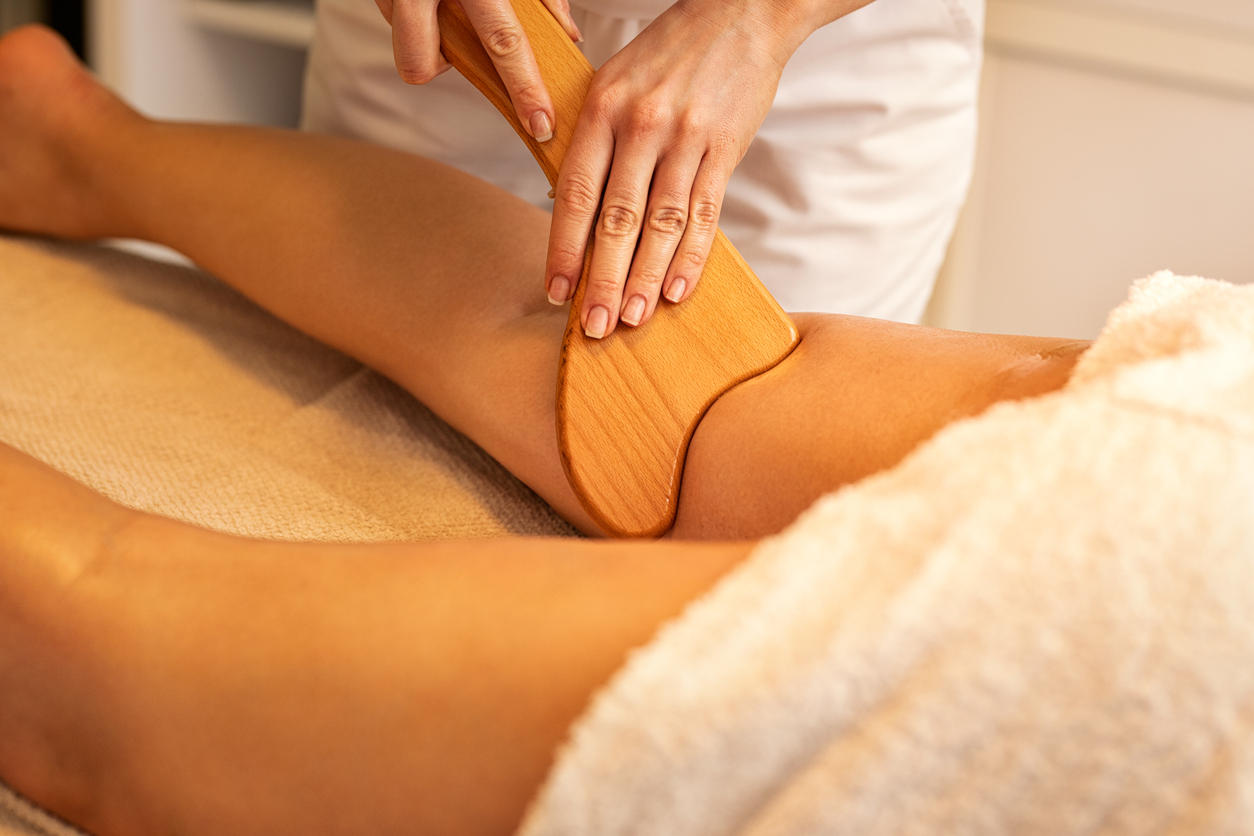 Anti-cellulite Madero Therapy massage done with specially designed wooden tool to eliminate accumulated toxins